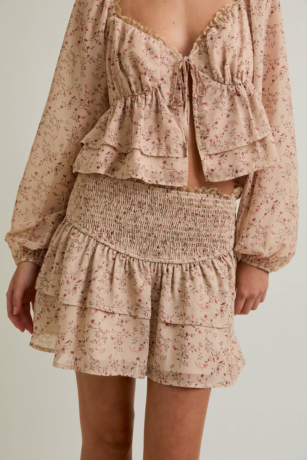 BEIGE PINK FLORAL MID WAISTED RUFFLE TIERED SKIRT for wholesale on Faire6