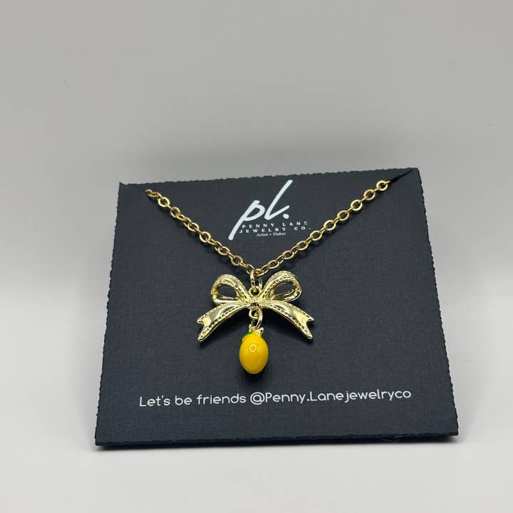 Penny Lane Jewelry Co - Wholesale Pendant/Charm Necklace - Daphne Gold Lemon Bow charm necklace 4