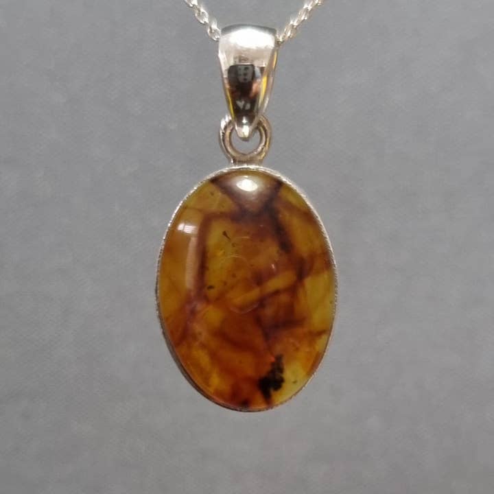Small Oval Baltic Amber Pendant | 925 Sterling Silver, AMBP12 for wholesale by Mistry Gems