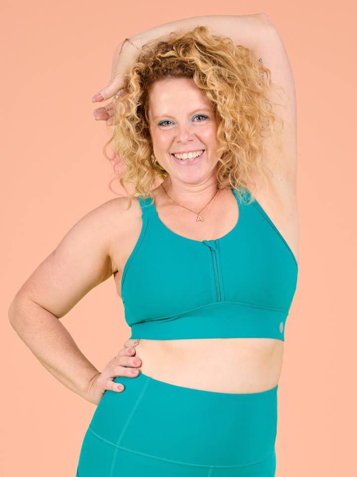 Teal FlexiZip Crop II för wholesale av Mama Movement