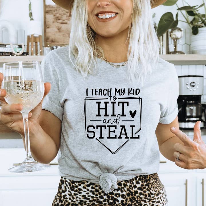 I Teach My Kid To Hit And Steal T-shirt for wholesale by KM Clothing