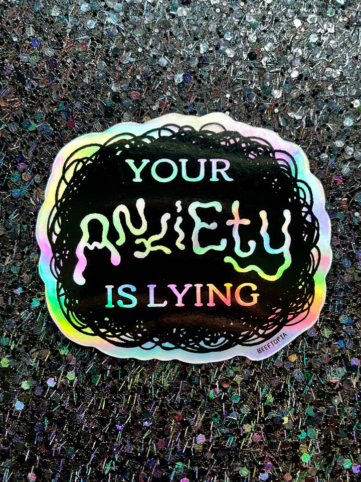 Your Anxiety is Lying 3 Inch Waterproof Holographic Sticker for wholesale by Beeftopia