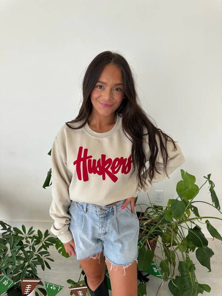 HUSKERS SCRIPT - SAND CREW for wholesale by h.flynn