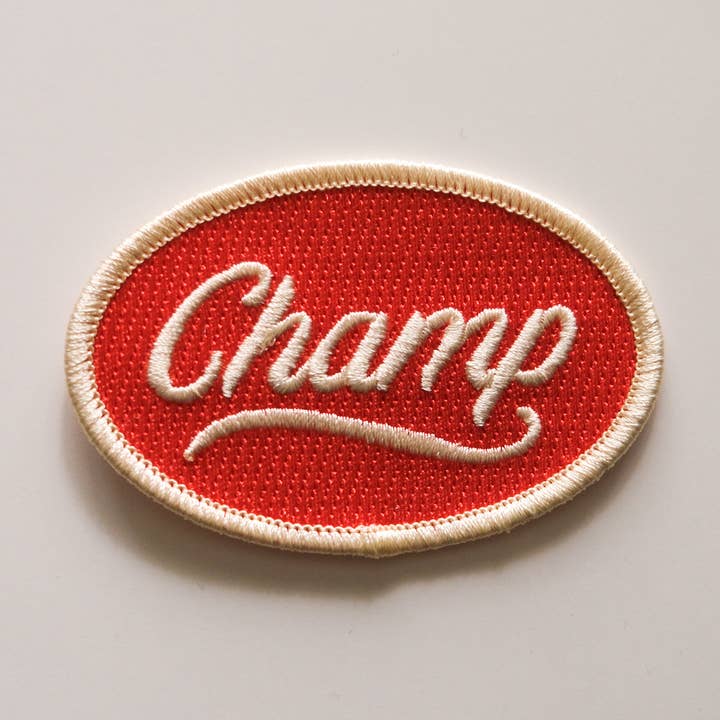 Champ Vintage Style Embroidered Iron On Patch for wholesale by Molly Illustration