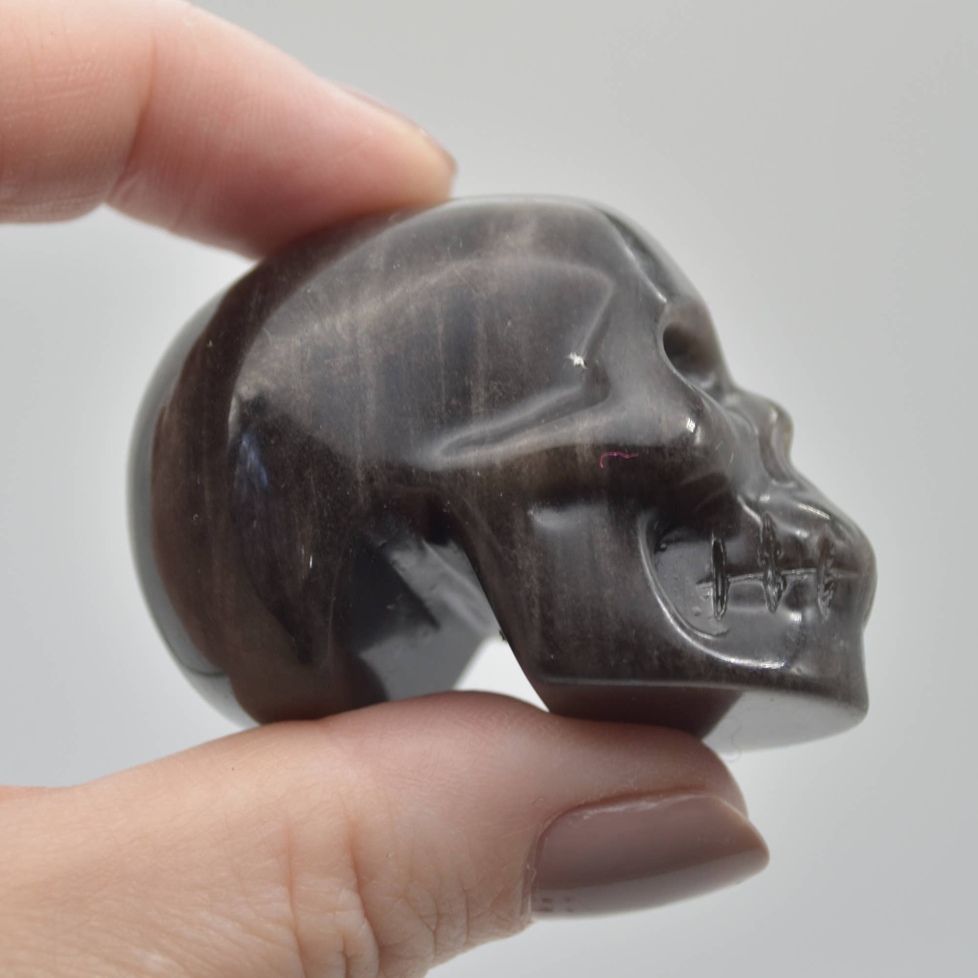 Zwart Zilveren Glans Obsidiaan Gesneden Schedelhoofd - 3,5 cm - 1 Stuk #01 voor groothandel op Faire6