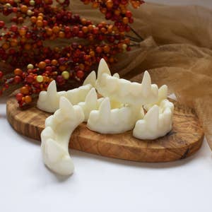 Purchase Wholesale vampire teeth. Free Returns & Net 60 Terms on Faire