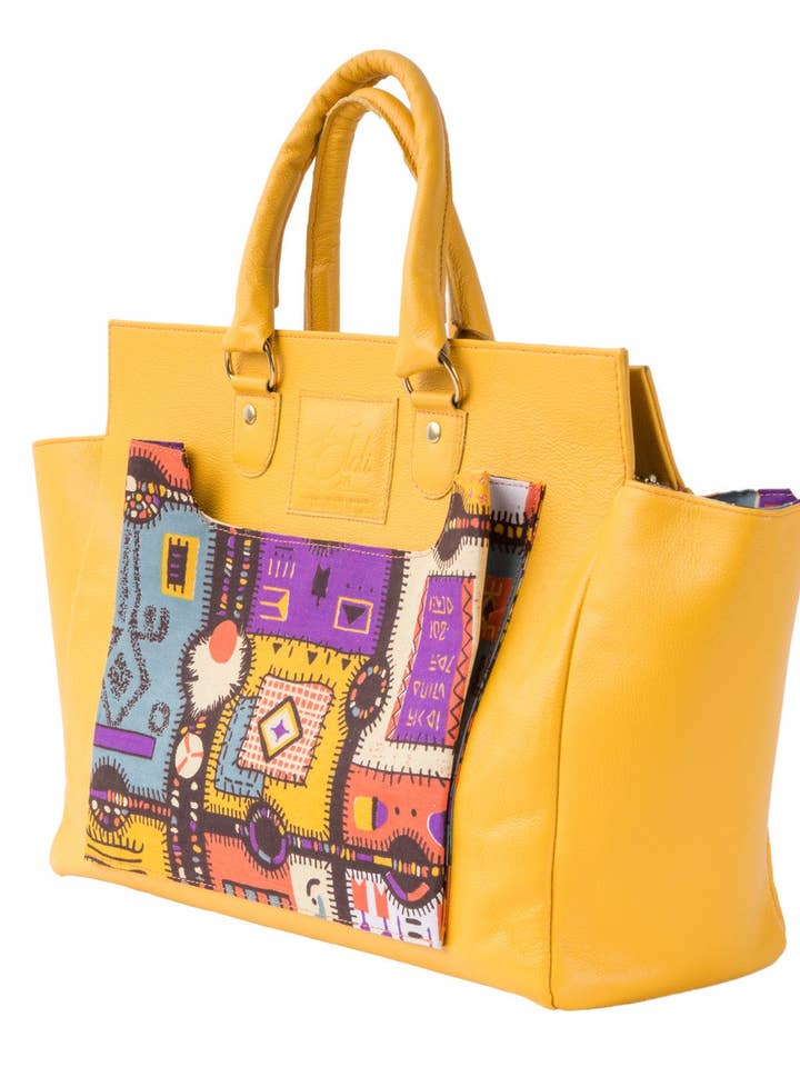 Borsa a tracolla gialla con stampa a puzzle per la vendita all'ingrosso da parte di Eloli