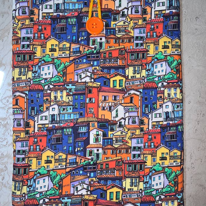 Padded book cover with colorful houses for wholesale by laubelgo