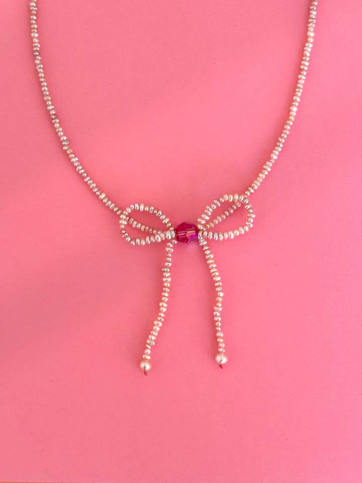 Roze strik kraag voor wholesale door Lis Aguilar