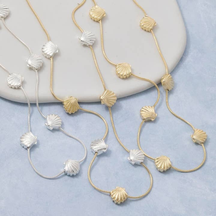 Mini Metallic Sea Shell Station Charms Chain Necklace for wholesale by The Looks by Fame Accessories