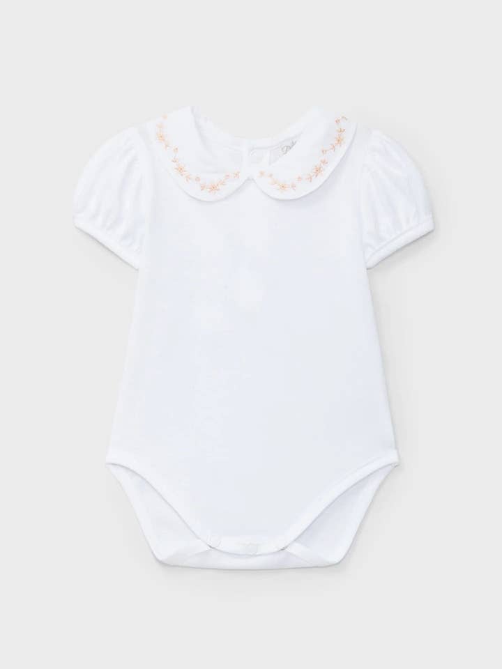 Body bianco a punto con dettaglio arancione neonato | Dr. Kid by Charanga per la vendita all'ingrosso da parte di Charanga