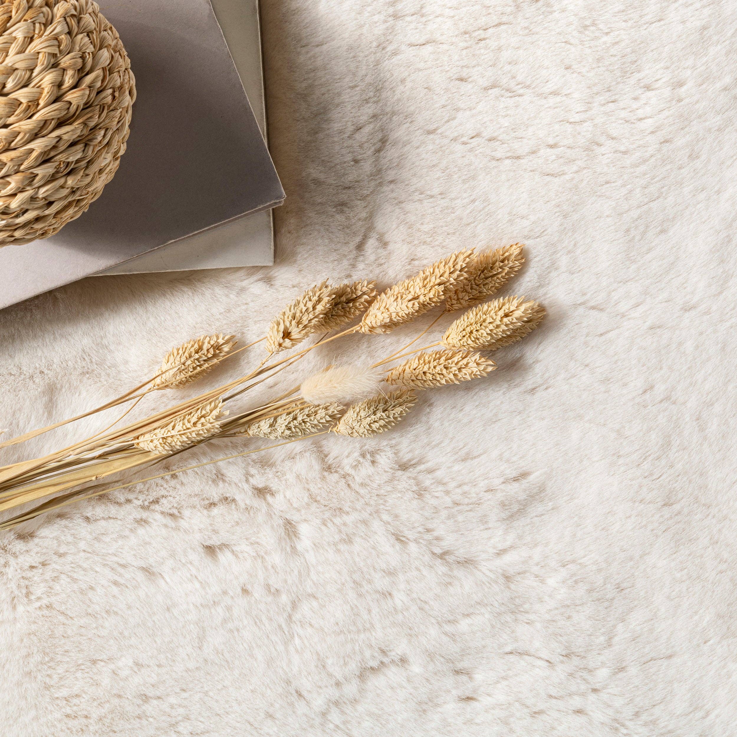 White Eline Faux Sheepskin Machine Washable Area Rug for wholesale on Faire5