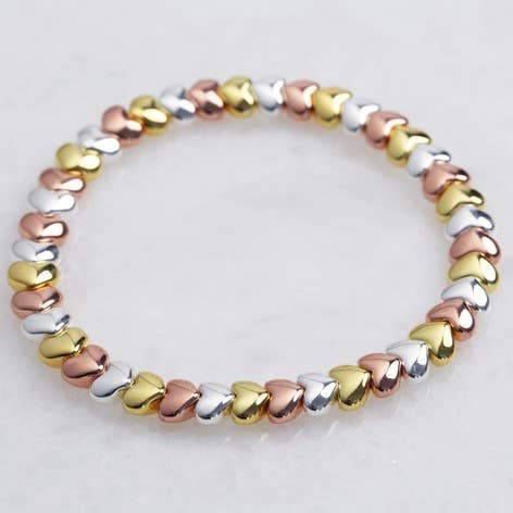Bracelet cœurs perlés en argent, or rose et or pour la vente par Lisa Angel