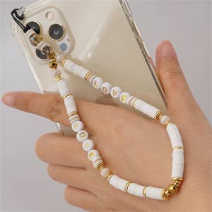 Purchase Wholesale beaded phone charm. Free Returns & Net 60 Terms on Faire