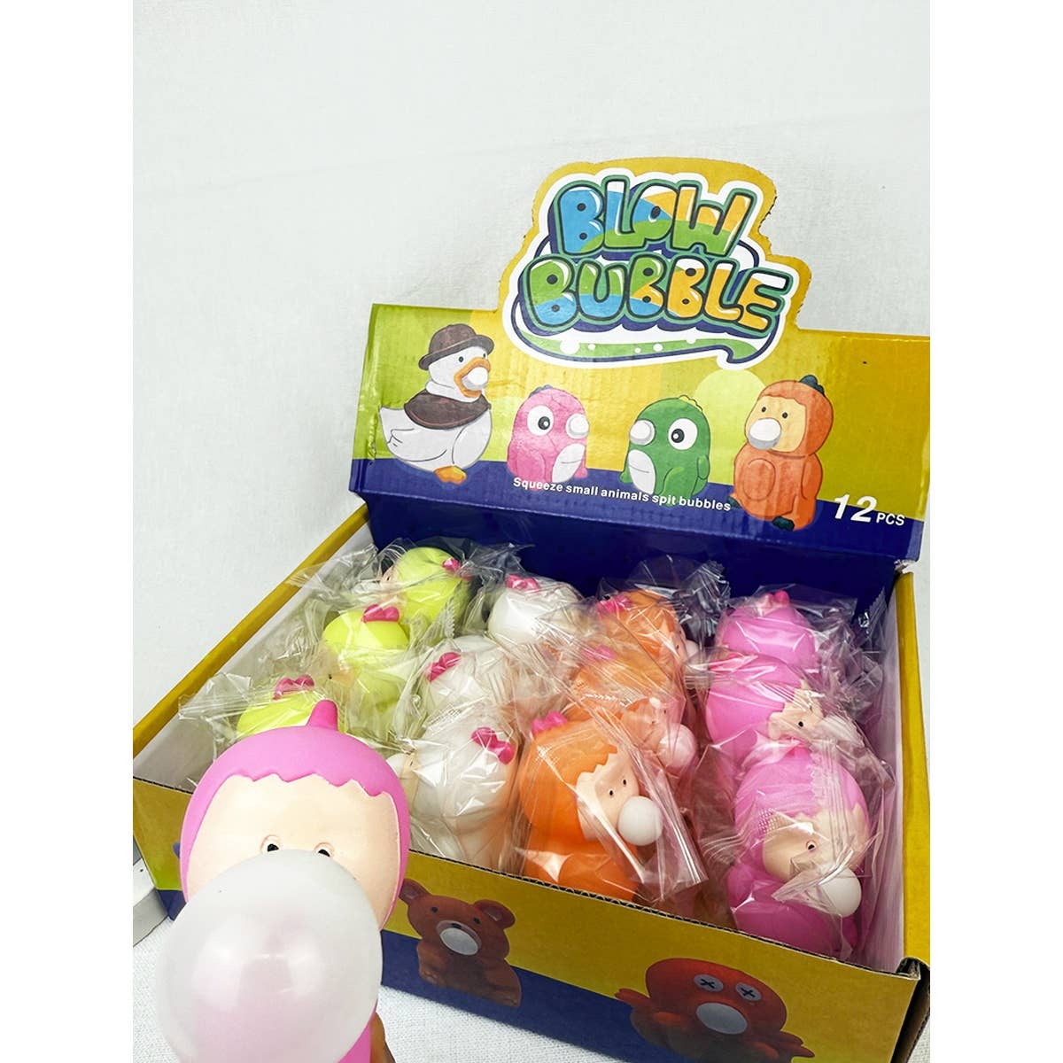 MIX COLOR Cute Babies Spit Bubbles Squeeze Toys for wholesale on Faire4