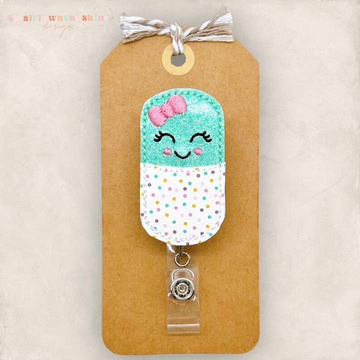 Pill Capsule Badge Reel - mint & polka dots for wholesale by The SmallTownSunshine Company