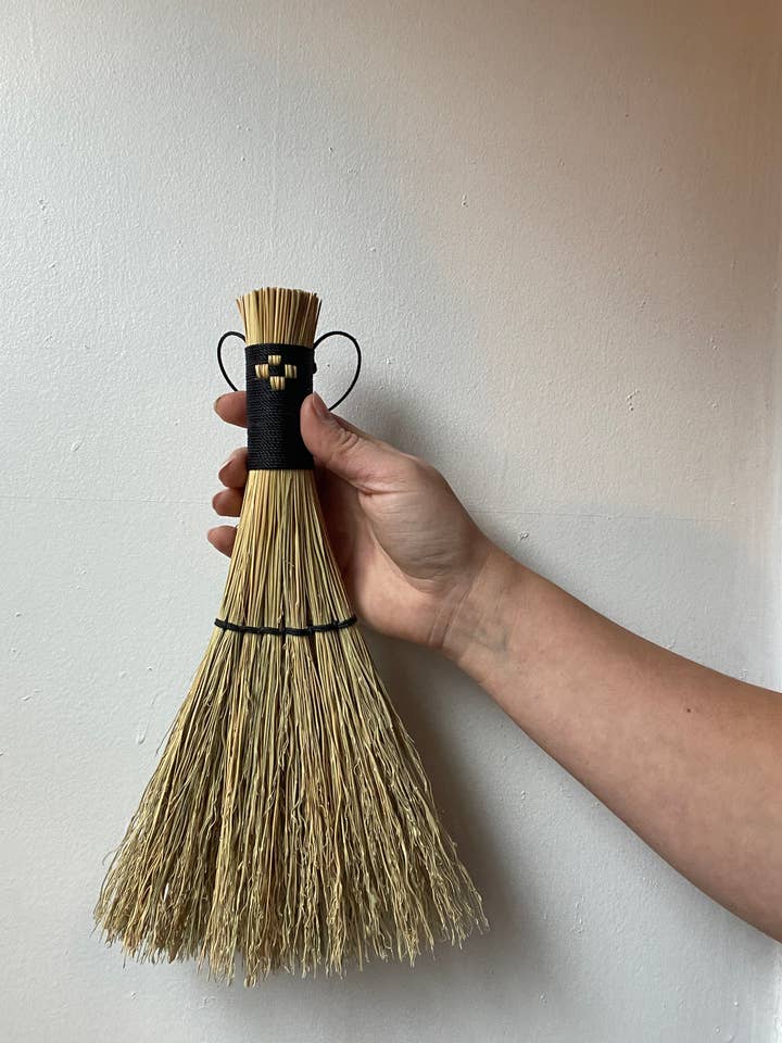 Rustic handcrafted quilted broom for wholesale by Husk Brooms