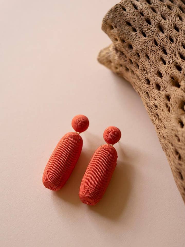 FABRIC-WRAPPED EARRINGS - CORAL for wholesale by Kalalou