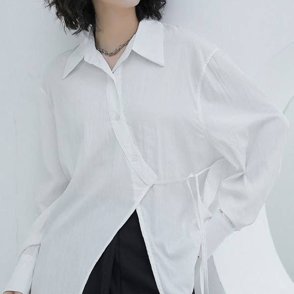 Asymmetrische, durchsichtige, einfarbige, durchsichtige Reversblusen mit lockeren Puffärmeln für den Großhandel von UZ Wholesale Store