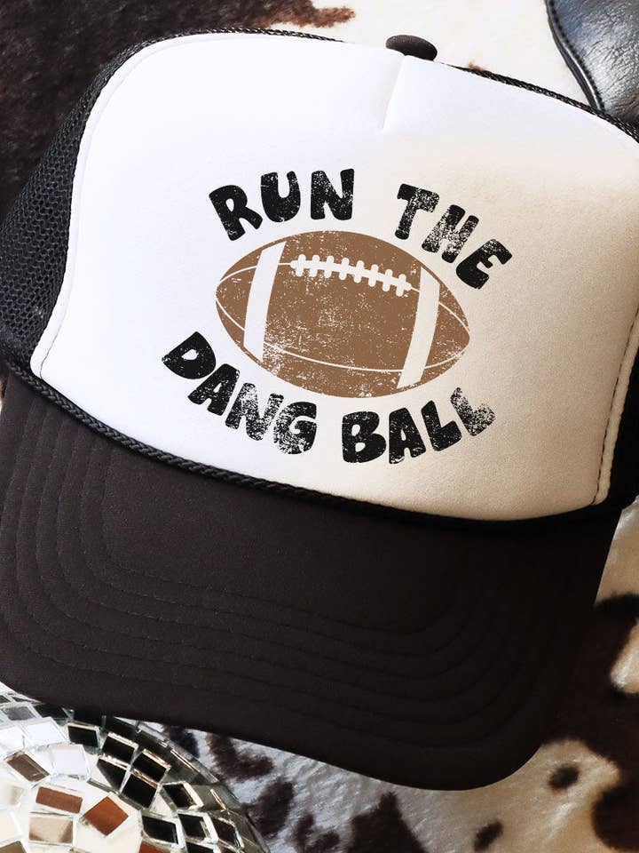 Run The Dang Ball Otto Black with White Foam Front Trucker Hat for wholesale by Wholesale Accessory Market