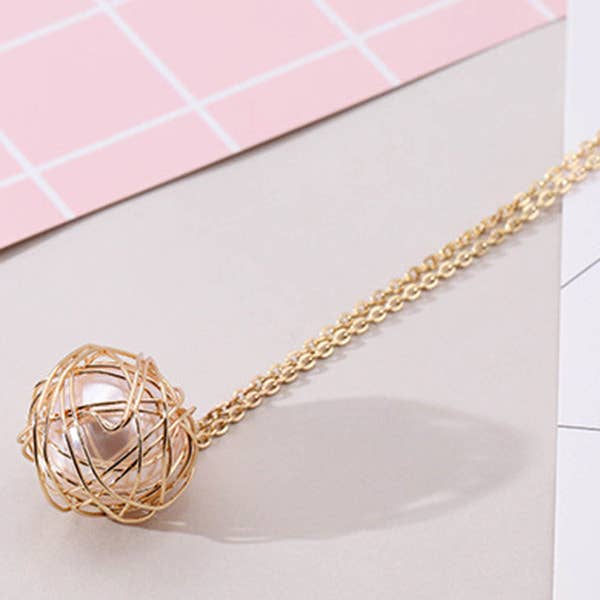 SAME AS PICTURE Hollow Out Peal Necklace for wholesale on Faire1