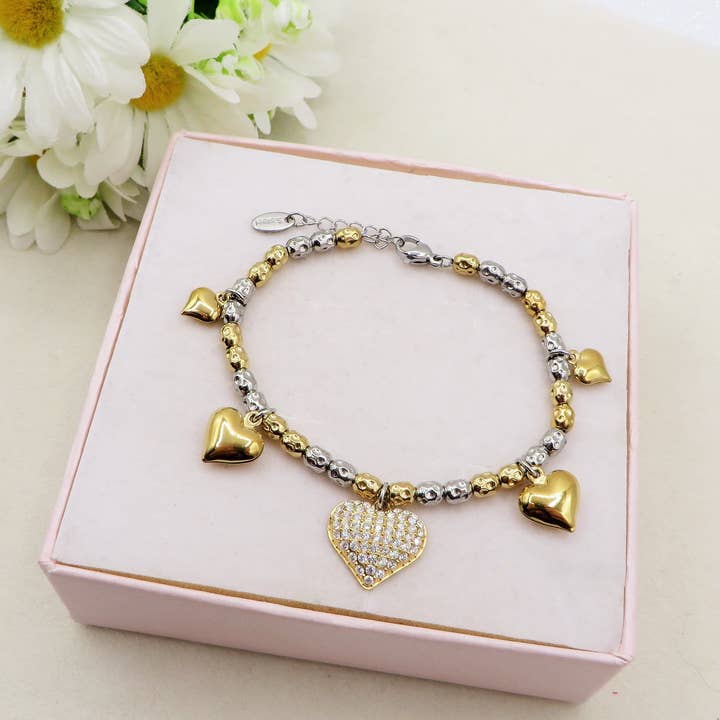 Lumière - Bracelet avec cœurs bombés en zircon cubique EN ACIER INOXYDABLE appelant les anges pour la vente par Daemon srls