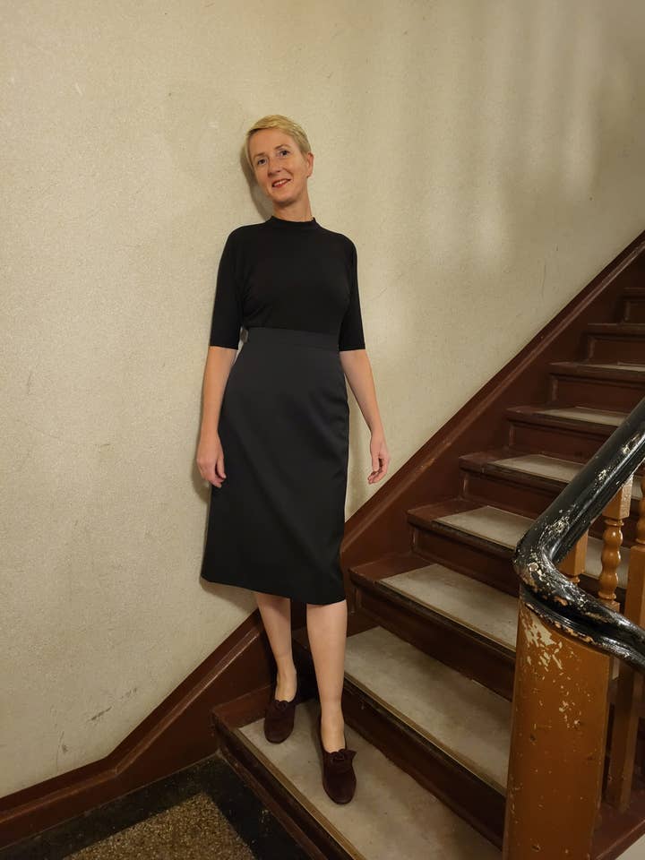 Emma, black jersey shirt with batwing sleeves for wholesale by Gabriele Sabe