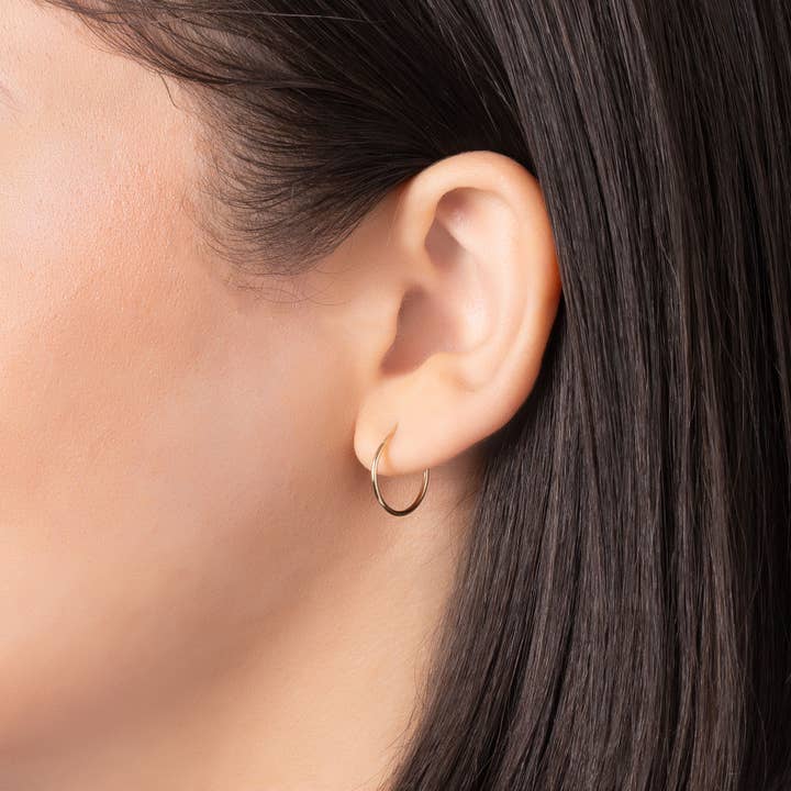 Or Créoles rondes sans fin 14 carats en vente sur Faire19