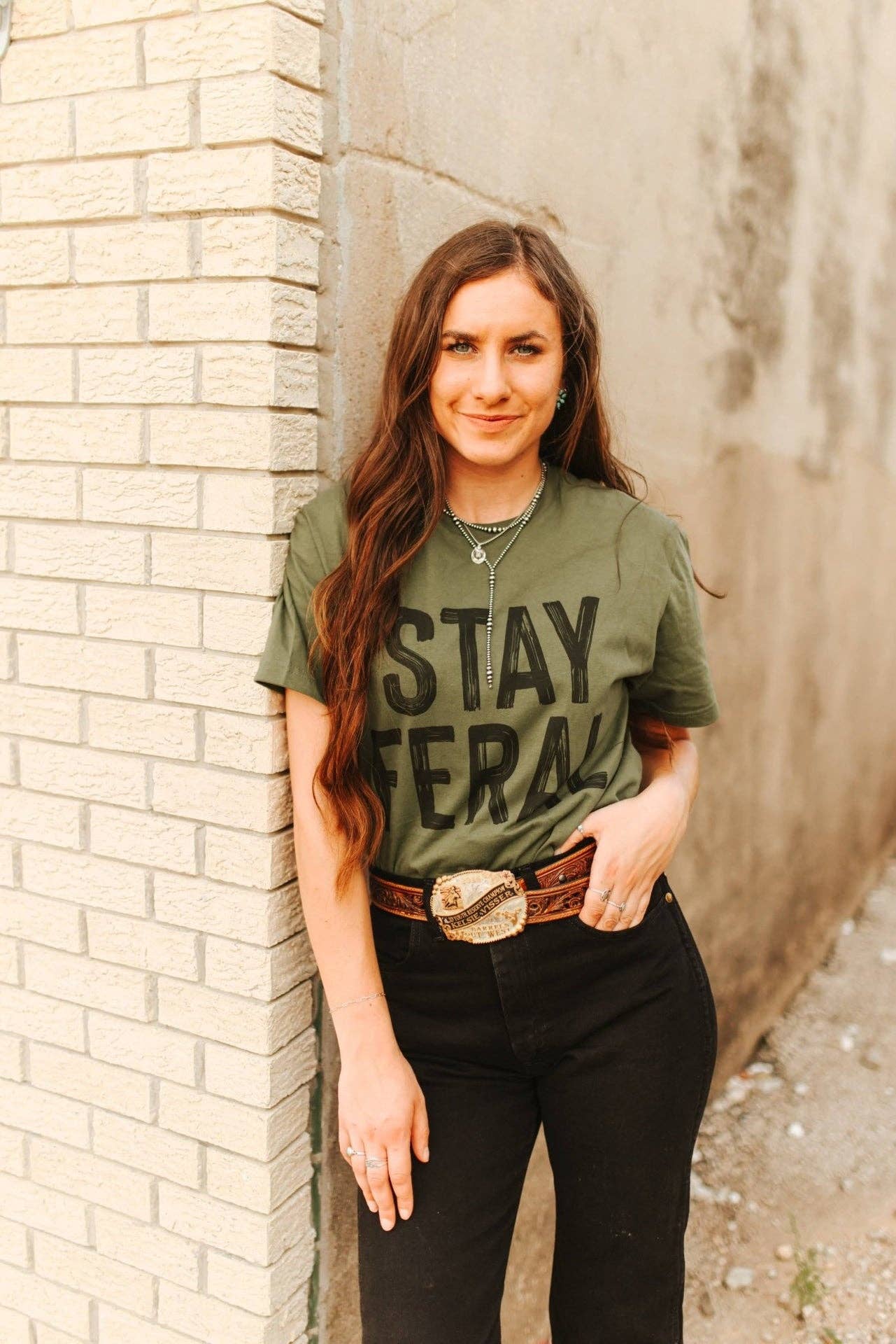 Military Green Stay Feral Graphic Tee for wholesale on Faire2