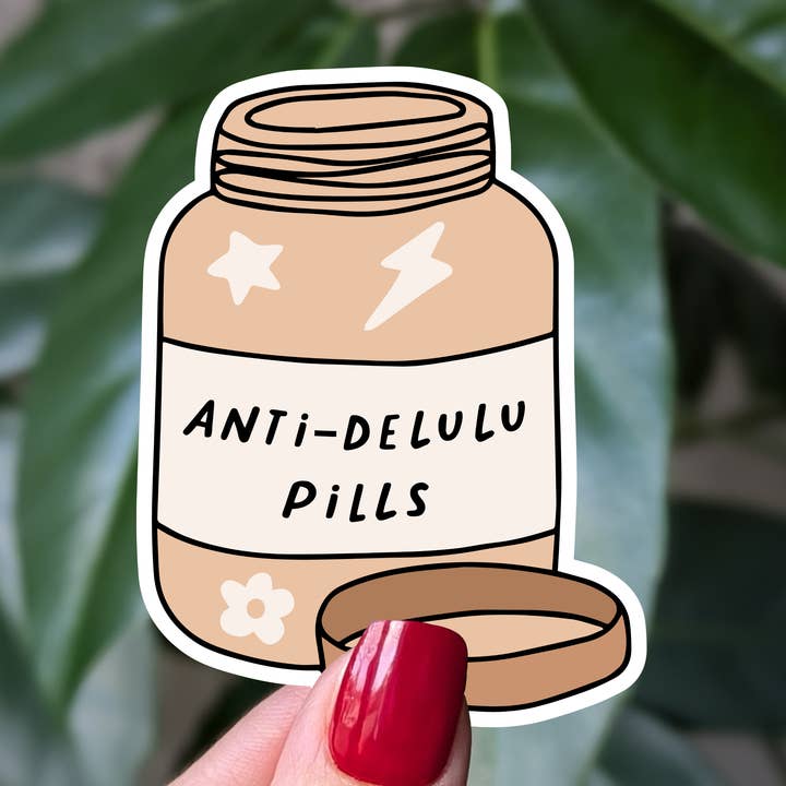 Anti-delulu pills vinyl sticker, funny mental health humor for wholesale by Moonlit Creations