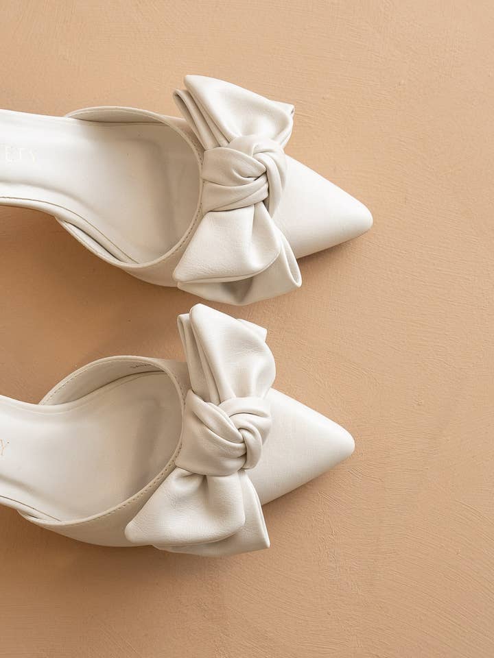 The Jane | White Pointed Toe Bow Accent Kitten Heel for wholesale on Faire