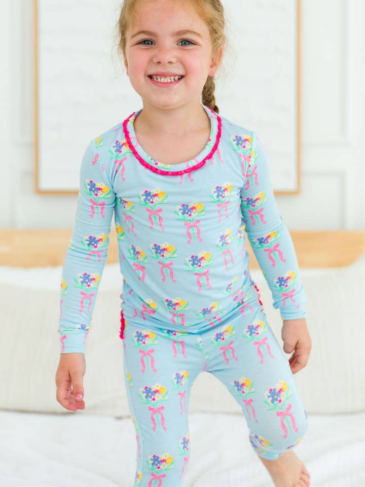 Blue SoftSnooze™ Toddler Girls Bamboo Viscose Bows and Bouquets Ruffle Long Sleeve Pajama Set with Signature Rear Ruffles
for wholesale on Faire3