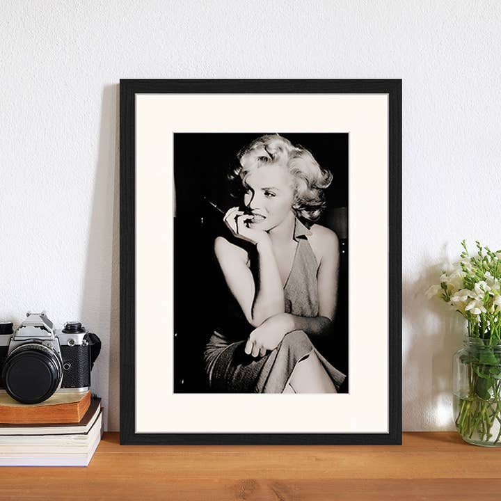 Black Marilyn Monroe image. Wall art print with frame. for wholesale on Faire