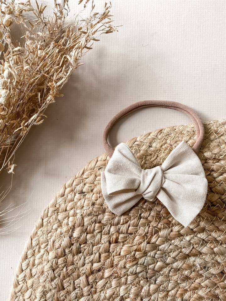 Maxi hair bow - beige linen for wholesale by Darci & Kobe