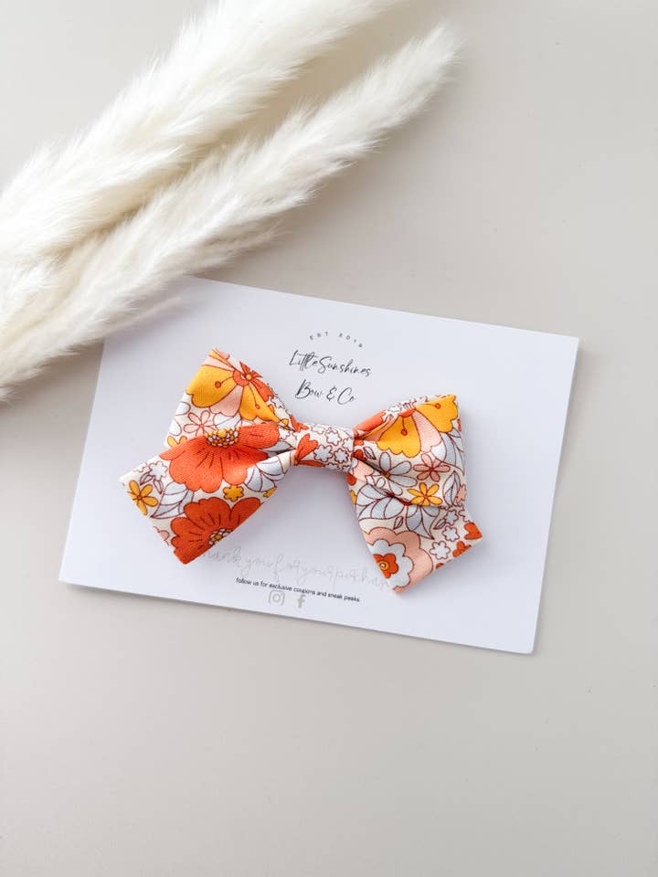 Burnt Orange & Yellow Flowers Pinwheel Hair Bow for wholesale by Little Sunshines Bow & Co