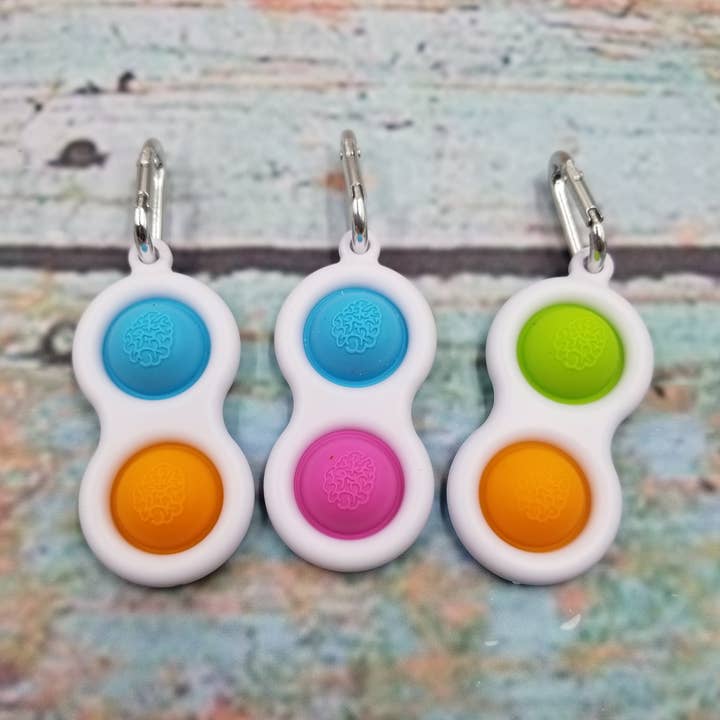 Pop Mini Keychain Simple Dimple Fidget Toy and other Purchase Wholesale mini pop it keychain. Free Returns & Net 60 Terms on Faire trending on Faire.