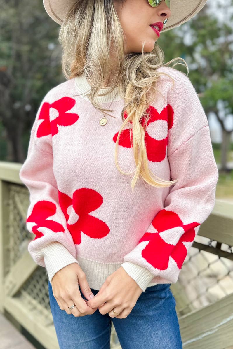 Rouge Pull douillet en tricot imprimé de marguerites rouges en vente sur Faire2