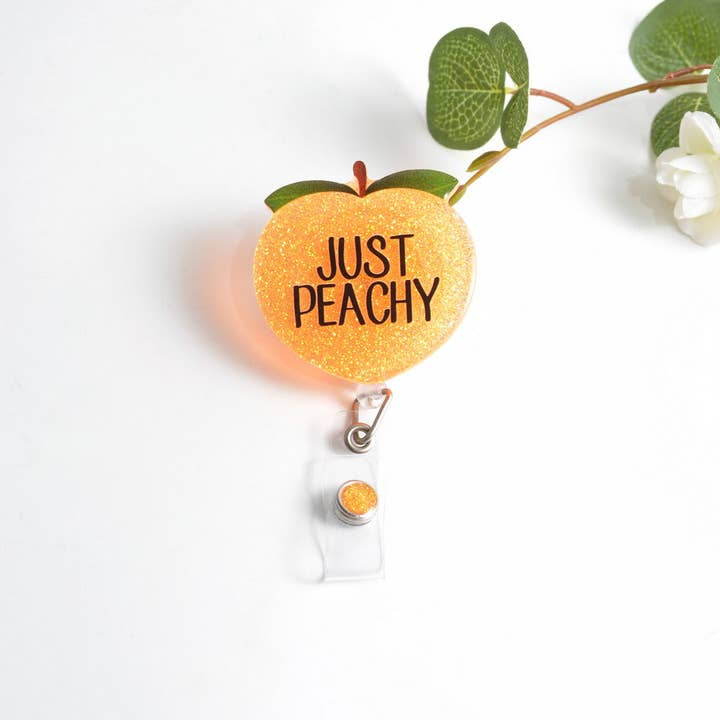 Glitterific Badge Reel Just Peachy for wholesale by OUTSIDE THE BOX, LLC