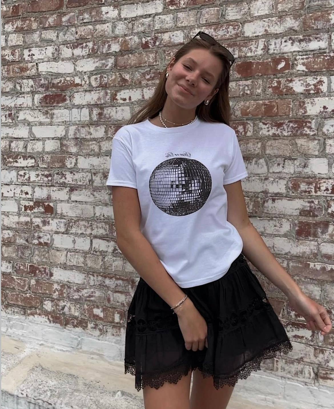 White Disco or Die Baby Tee for wholesale on Faire5