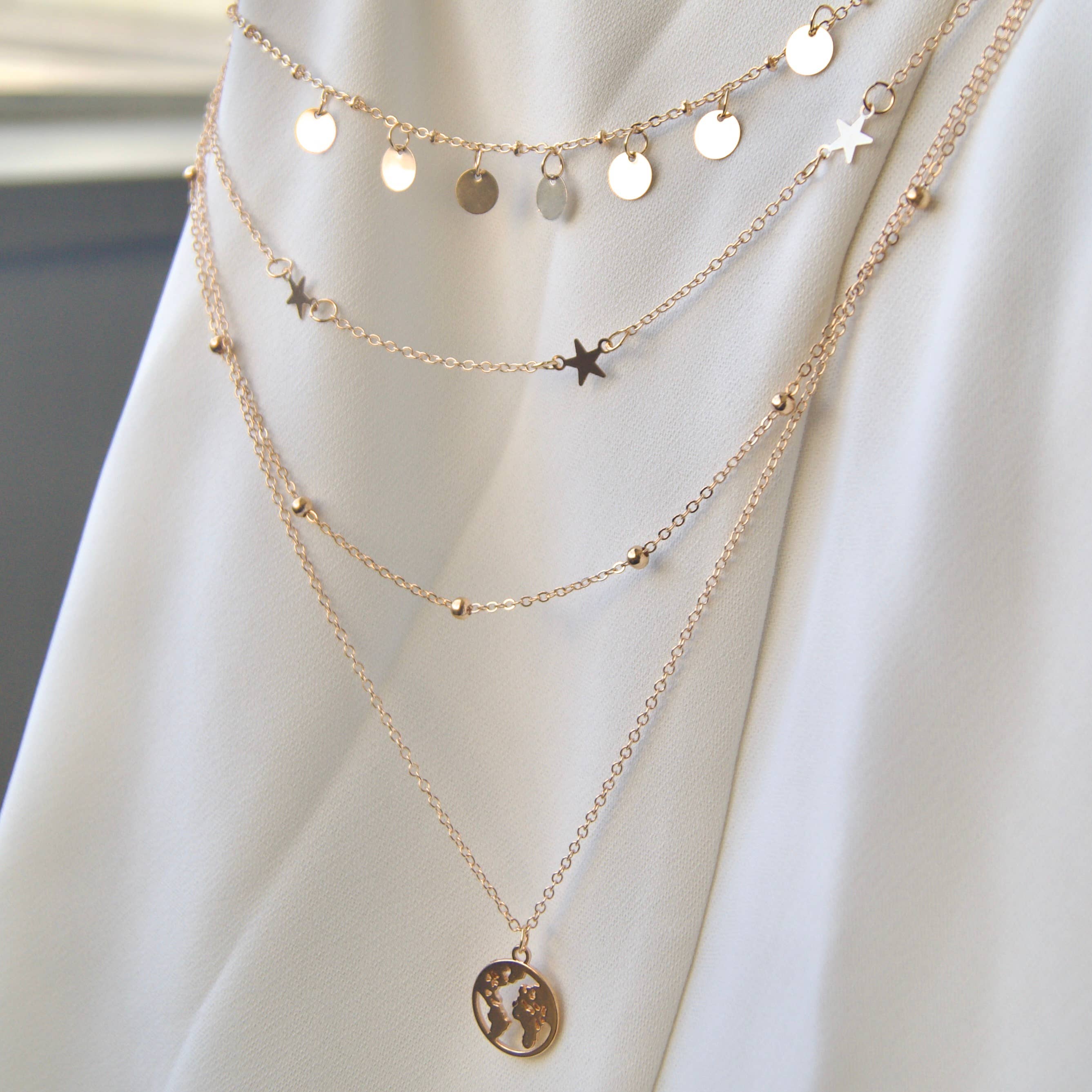 EAST INDIA IMPORTS - Vente Colliers à pendentif - Collier en or à étages avec pendentifs étoile et globe1