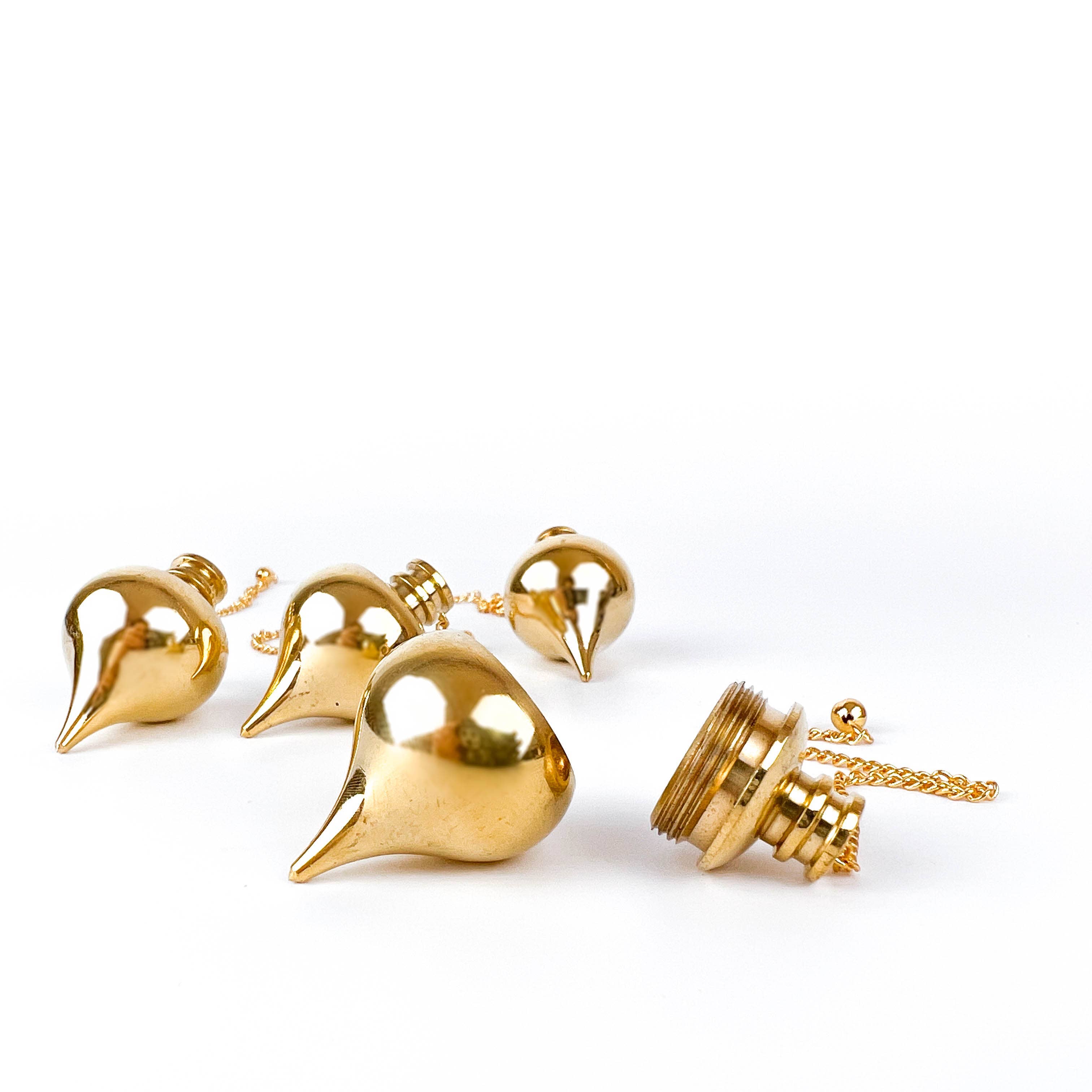 GREENROOTS USA LLC - Venta al por mayor Artículo de meditación - Péndulo con acabado dorado con compartimento 1,25L con cadena 18,4 cm 4P4