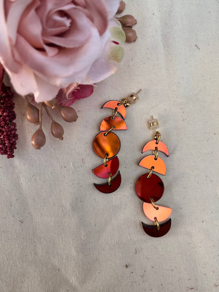 Spooky Red Iridescent Phases of the Moon for wholesale by Studio Nena