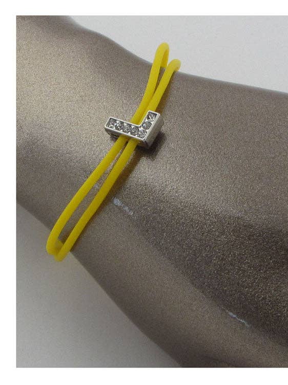 Multi Colored Rubber Bracelets W/charm Letters That Spell Ou for wholesale by CC Wholesale Clothing