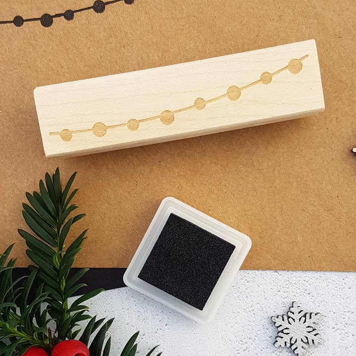 Christmas String of Lights Rubber Stamp for wholesale by Skull and Cross Buns Rubber Stamps