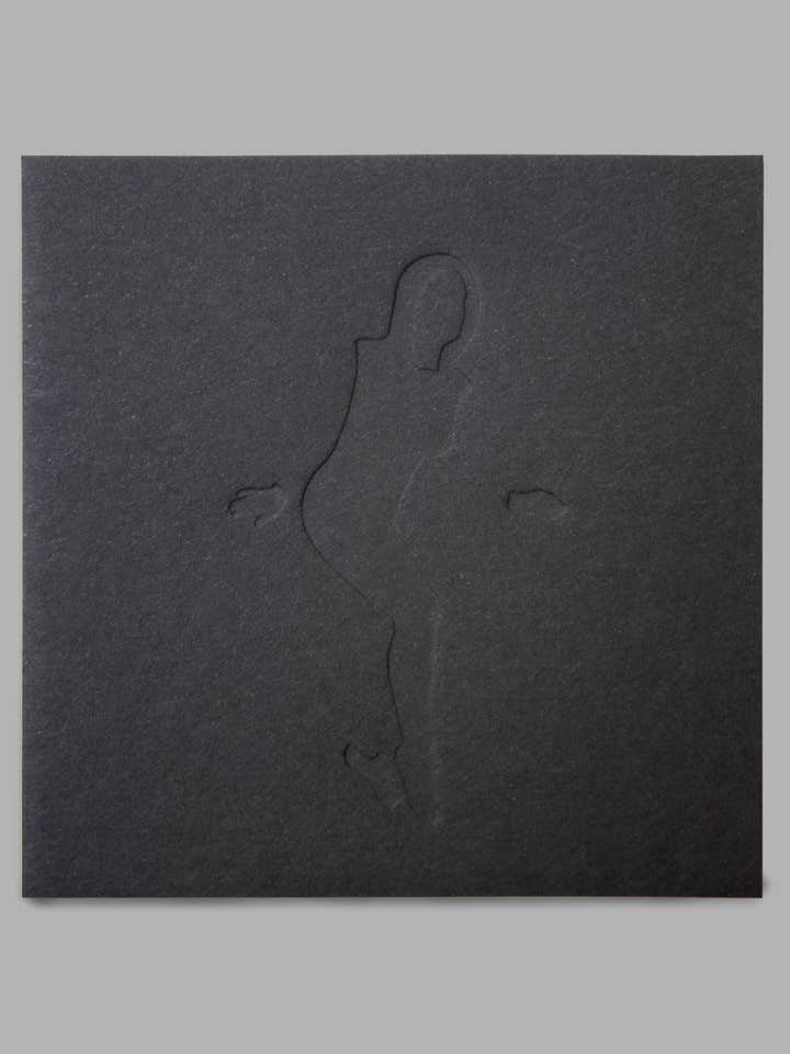 Debossed Hidden Letterpress Print set in white, yellow & blk for wholesale by normal Behaviour