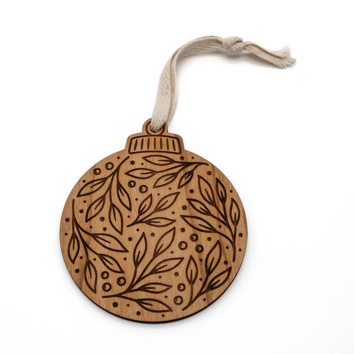 Festive Botanical Engraved Wood Ornament for wholesale by Wildewood Handcrafted Goods