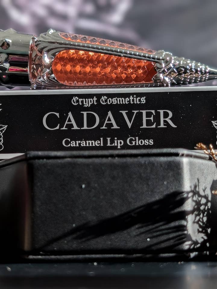 CADAVER (Silver Edition) - Warm nude caramel lip gloss for wholesale by Crypt Cosmetics