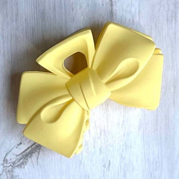 Fermaglio per capelli Bow Coquette Claw Matt Accessorio per capelli giallo per la vendita all'ingrosso da parte di iconic mi