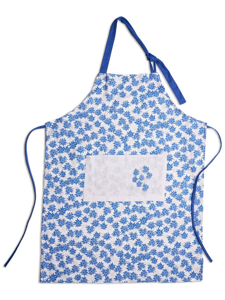Rukki Fields of windswept cornflower 100% linen aprons. Available in two sizes, adult and child. for wholesale by Eva-Lea Design Studio