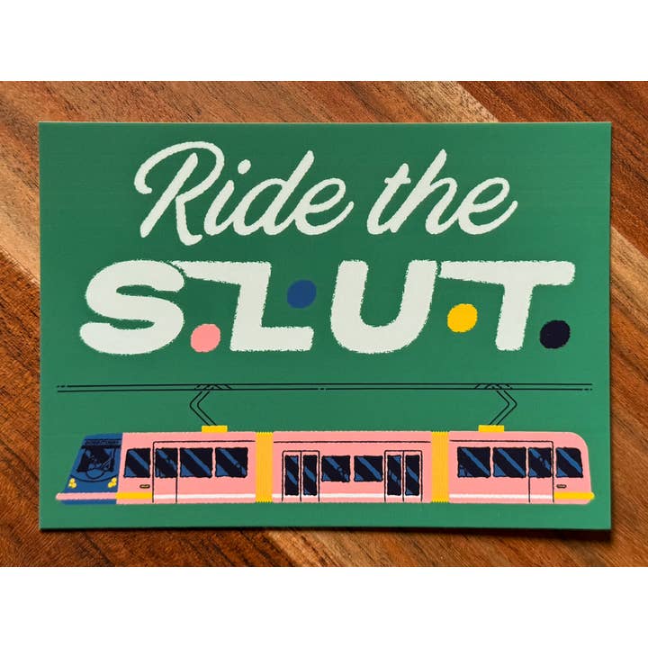 Wug Prints - Wholesale Postcard - Ride the S.L.U.T Seattle South Lake Union Trolley Postcard